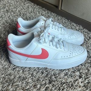 Women’s white Nikes. SIZE 9.5. GREAT condition!